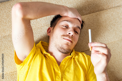 Sad Young Man with a Cigarette