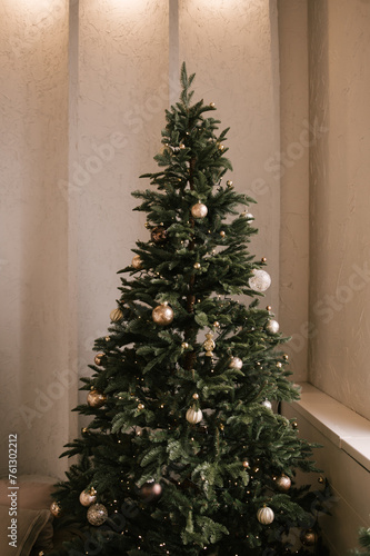 Beautiful New Year decor, Christmas tree in the bedroom
