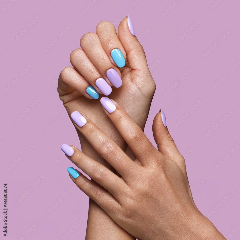 Stylish trendy women's manicure. Blue and lilac color gel Polish. The view from the top