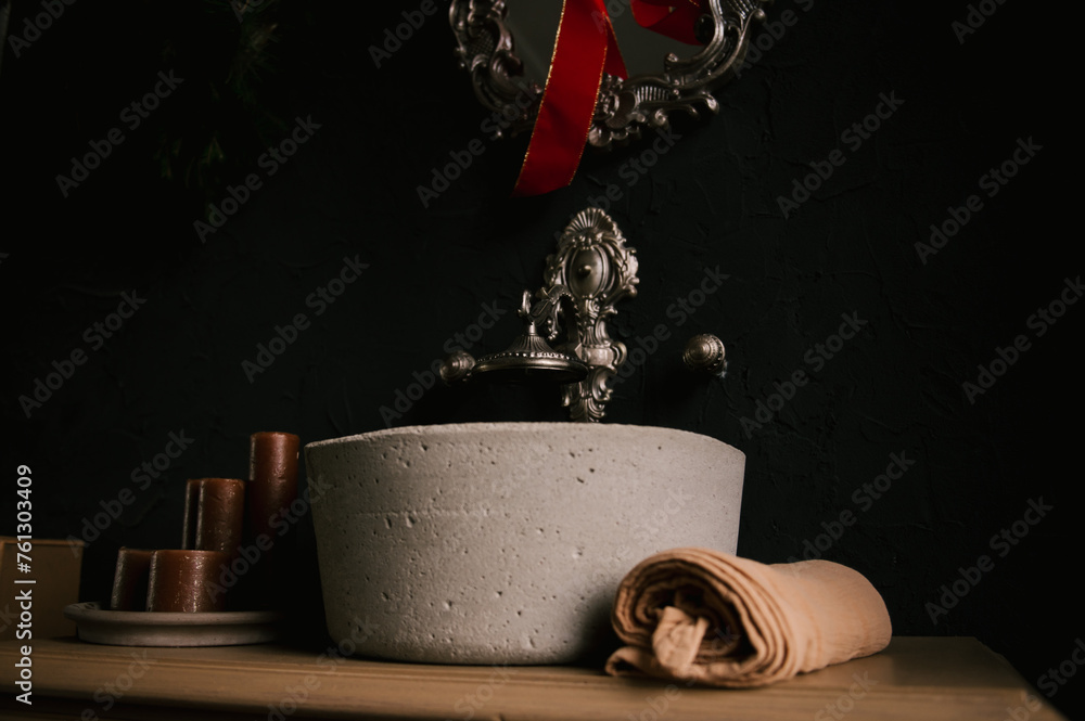 Stylish modern japandi interior, concrete sink with vintage faucets and mirror