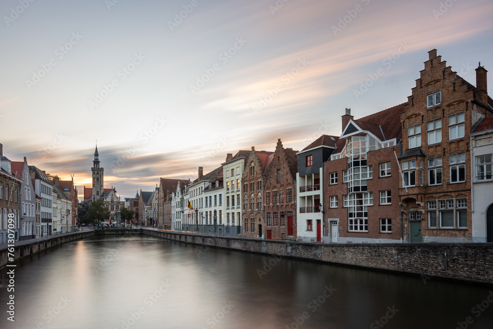 The golden hour at sunrise in the historic center of Bruges, Belgium in early autumn