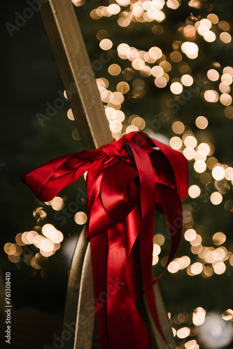 Obraz na płótnie Beautiful New Year decor, red bows close-up, selective focus w salonie
