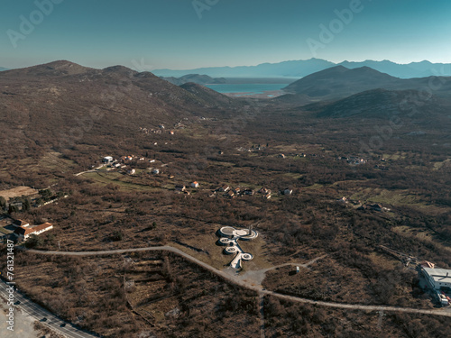 Barutana Spomenik - Yugoslavia´s Monument in Montenegro almost on the seaside panorama (Brutalism, aerial shot) photo