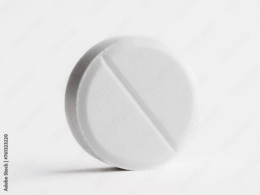 One pill isolated on white. Drug therapy One pill isolated on white. Drug therapy