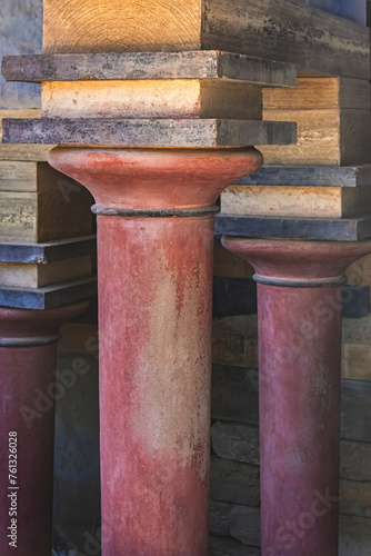 Red Minoan columns at Knossos Palace. Crete, Greece