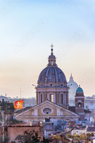 Basilica San Carlo al Corso in Rome. Dusk falls on Rome's San Carlo al Corso church, its dome and cross catching the fading light. Rome, Italy