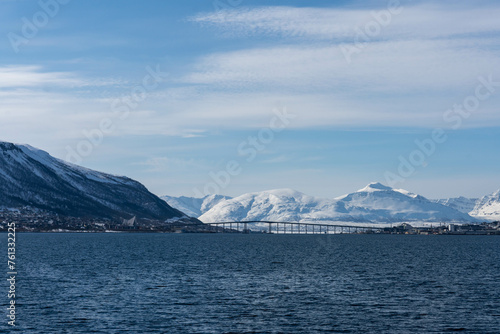 Tromsø Bridge and Arctic Cathedral with winter mountain landscape, Tromso, Norway © Isra.Suvachart