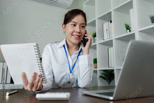 Business woman talking on mobile with client, business partner for business meeting