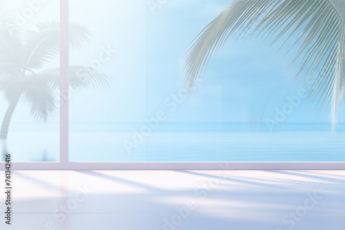 Window overlooking ocean with palm tree in background