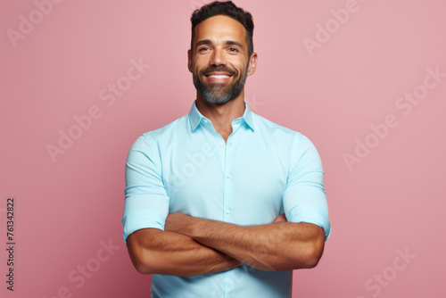 Man with blue shirt and smile on his face