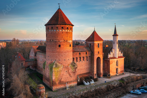 Fototapeta Naklejka Na Ścianę i Meble -  Teutonic castle in Reszel at sunset, Poland.