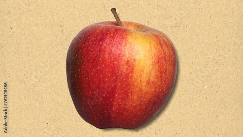 red apple fruit over paper