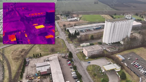 Aerial infrared thermal view of industrial zone with factories and warehouses, in purple and yellow hues
 photo