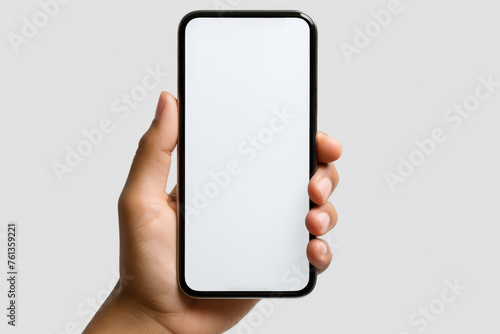 Person is holding phone with white screen