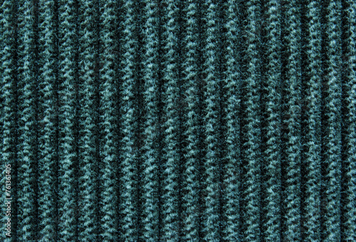 Dark green corduroy fabric texture as background