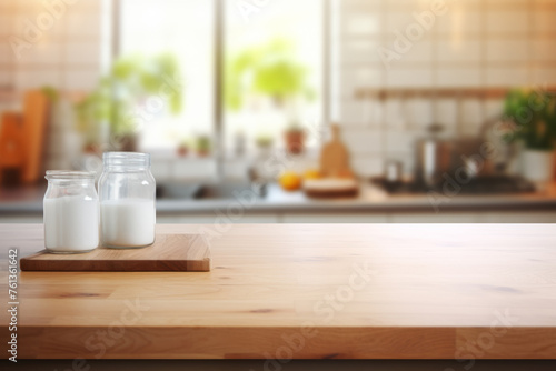 Two milk jugs on wooden cutting board