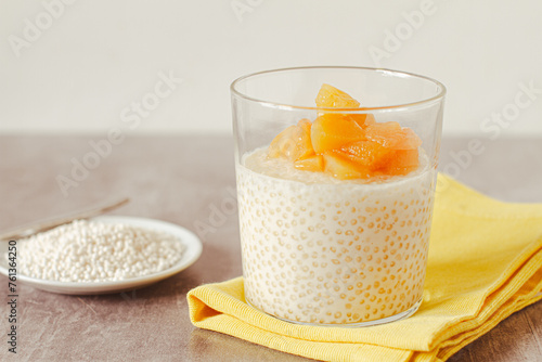 Canvas Print Tapioca pudding with vegan milk and exotic fruits compote