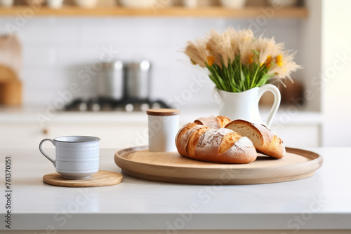 Tray of bread and cup of coffee sit on counter in kitchen