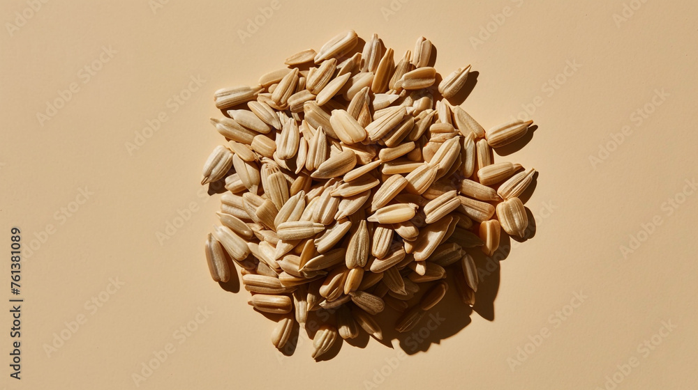 commercial stock flat lay photo of small pile of about five raw white sunflower seeds against light tan background сreated with Generative Ai commercial stock flat lay photo of small pile of about five raw white sunflower seeds against light tan background сreated with Generative Ai
