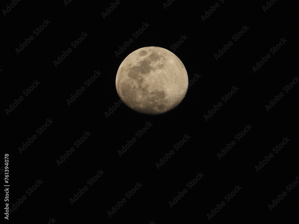Almost full moon in the dark sky Almost full moon in the dark sky