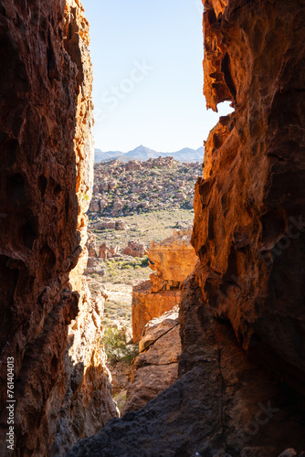 landscape photo of a view of a rock formations through a crack in the Cederberg, western cape