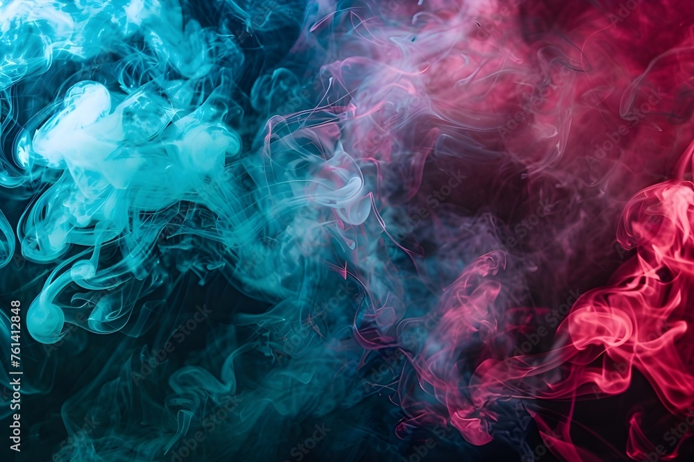 Clouds of colored smoke on a black background.Blue and purple colors. Dynamic abstraction.
