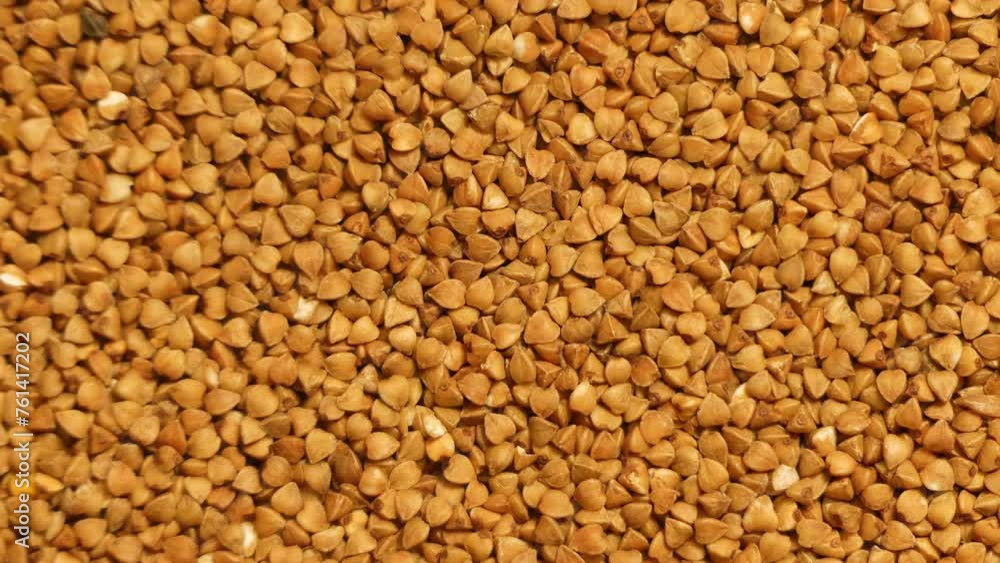 Many grain of buckwheat is spinning in a circle. Many grain of buckwheat is spinning in a circle.