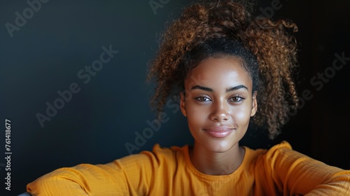 Woman in Yellow Shirt Posing for Picture