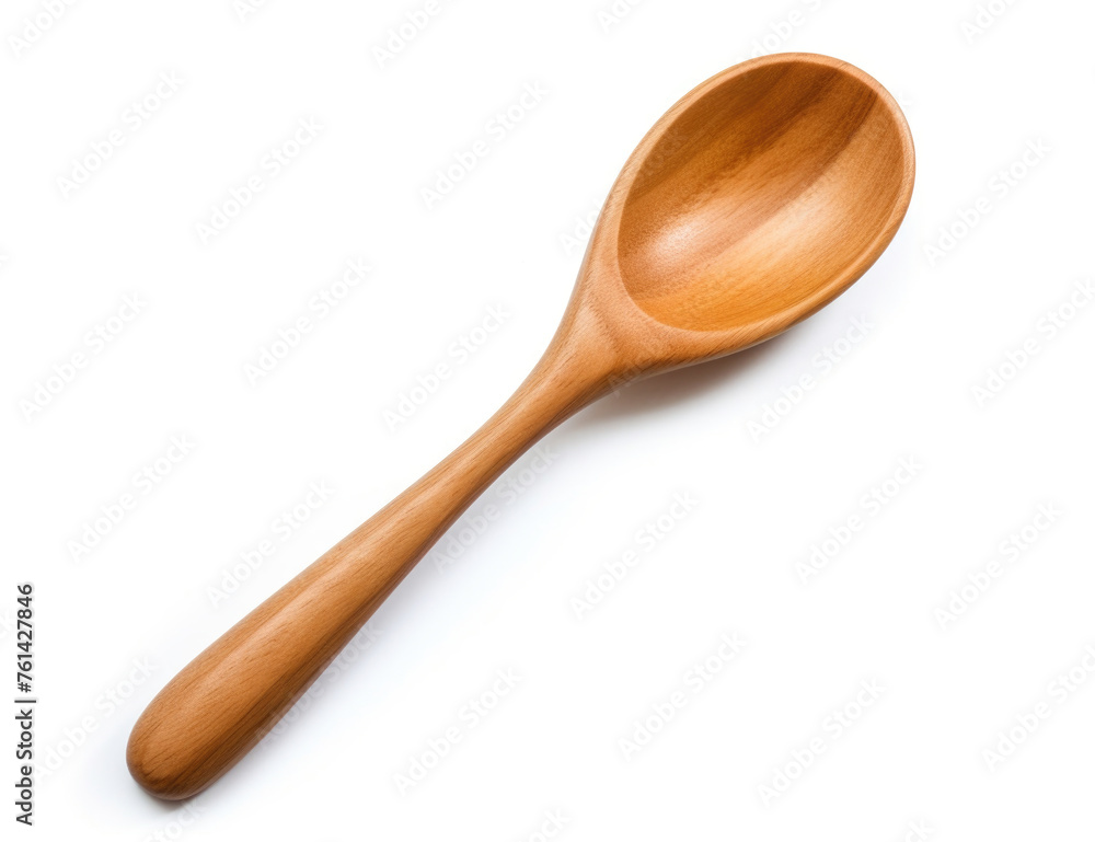 A wooden spoon placed on a plain white surface A wooden spoon placed on a plain white surface