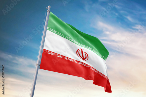 Waving flag of Iran in blue sky. Iran flag for independence day. The symbol of the state on wavy fabric.