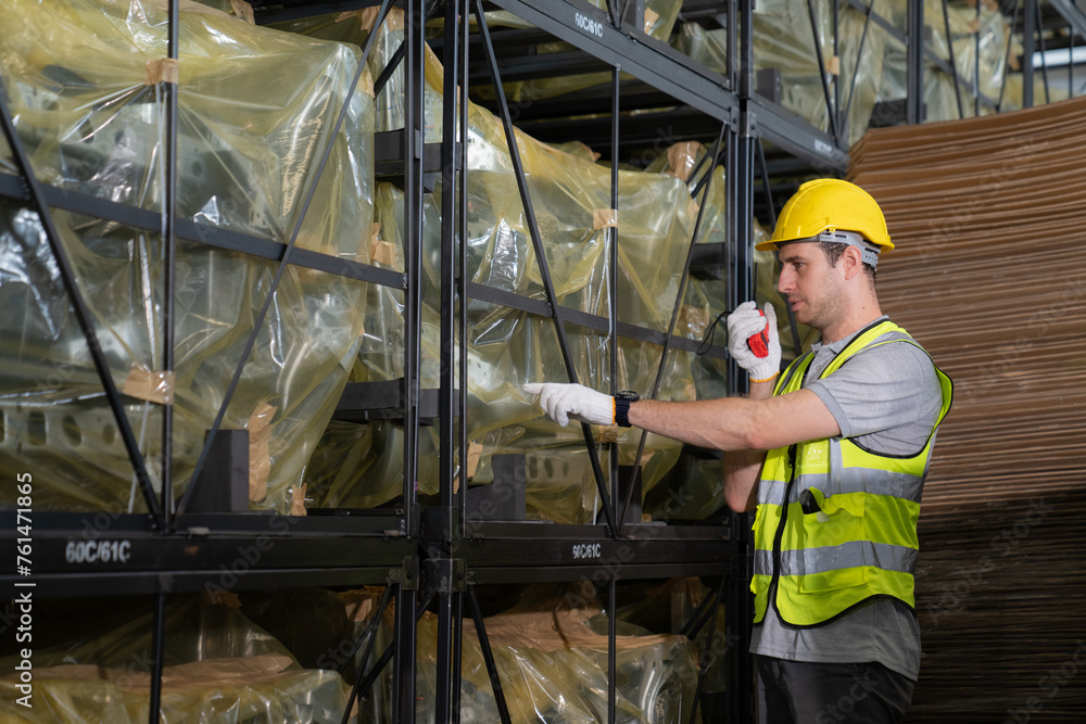 Warehouse workers and managers check stock and inventory by using digital tablet computers in the retail warehouse full of shelves with goods. Working in logistics and distribution center. Warehouse workers and managers check stock and inventory by using digital tablet computers in the retail warehouse full of shelves with goods. Working in logistics and distribution center.