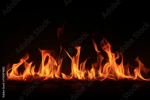 Fire flames on a black background an abstract concept.