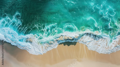 Relaxing aerial beach scene, summer vacation holiday template banner. Waves surf with amazing blue ocean lagoon, sea shore, coastline. Perfect aerial drone top view. Peaceful bright beach, seaside © Mudhoffar