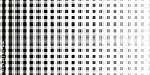 A fine dotted texture- black and white vector pattern