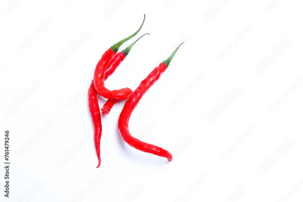 Red chilli peppers isolated on white background Red chilli peppers isolated on white background