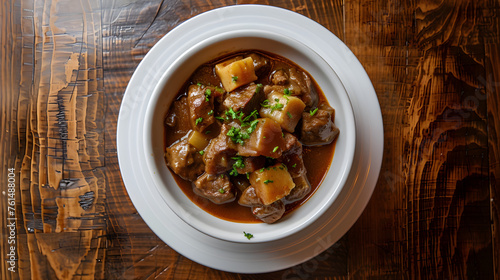 Traditional beef stew in white bowl