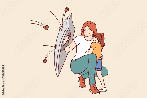 Mother protects little daughter from flying stones using steel shield, demonstrating courage and dedication in raising children. Caring mother saves frightened girl from attacks of others
