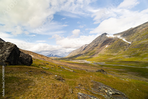 A beautiful summer landscape of Sarek National Park with river. Wild scenery of Northern Europe. photo