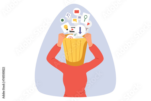 Garbage clogging woman brain, from multimedia icons above head with trash can. Concept of importance of meditation and brain cleansing to avoid burnout caused by overabundance of information