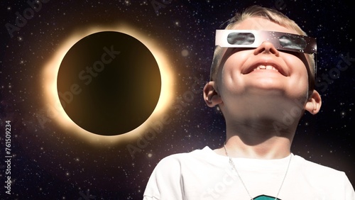 Konstfotografi A little boy in solar eclipse protective sunglasses fantasizes about space travel and eclipses