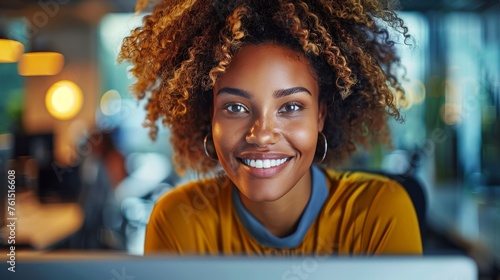 Woman Sitting at Table With Laptop