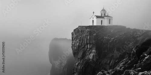 A striking image of a church perched on a cliff, perfect for religious themes or dramatic landscapes