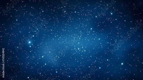 Stars fall in the dark blue night sky