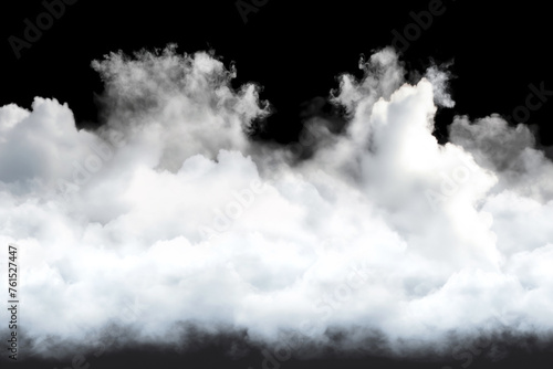 A dark background with a dense cloud of smoke or steam