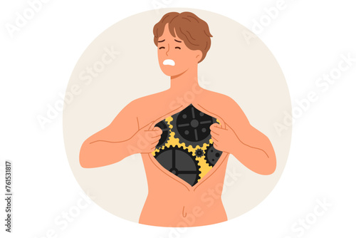 Man cyborg tears skin on chest cage, demonstrating robotic mechanism instead of organs and making painful grimace. Guy who became cyborg after replacing heart with gears and using future technologies