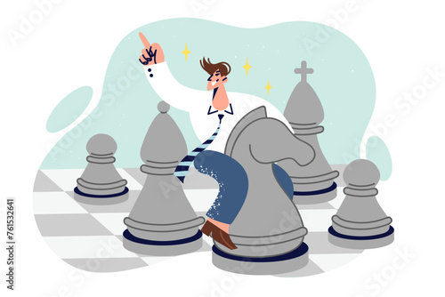 Business man plays chess sitting astride knight chess piece, demonstrating strategic thinking