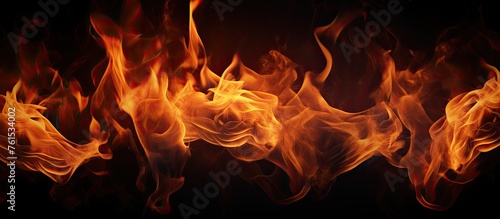 A close up shot of a bonfire blazing against a dark background, showcasing a mesmerizing display of flames and heat in electric blue hues