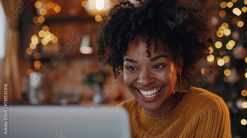 Therapist smiling while discussing treatment plan via webcam.