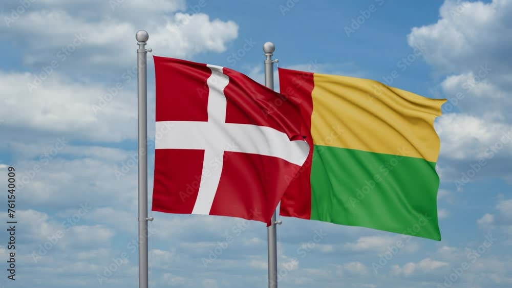 Guinea-Bissau and Denmark two flags waving together, looped video, two country relations concept Guinea-Bissau and Denmark two flags waving together, looped video, two country relations concept
