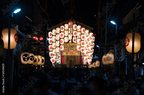 Lanterns of Yamahoko floats lit up at night during the Gion Festival photo